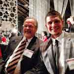 Jerry and Jason smile at the excuive award dinner