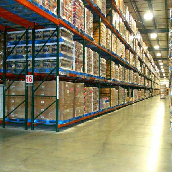 View of aisle in a distribution warehouse with double deep pallet racking