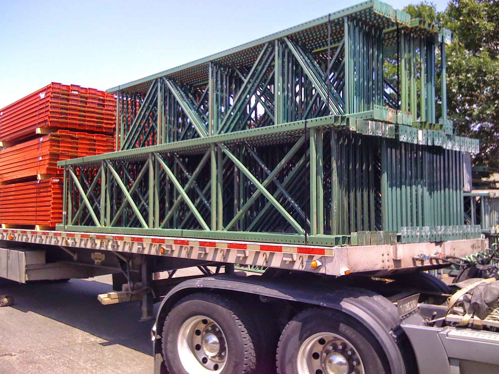 Used Pallet racking sits on the bed of a truck ready to be shipped out