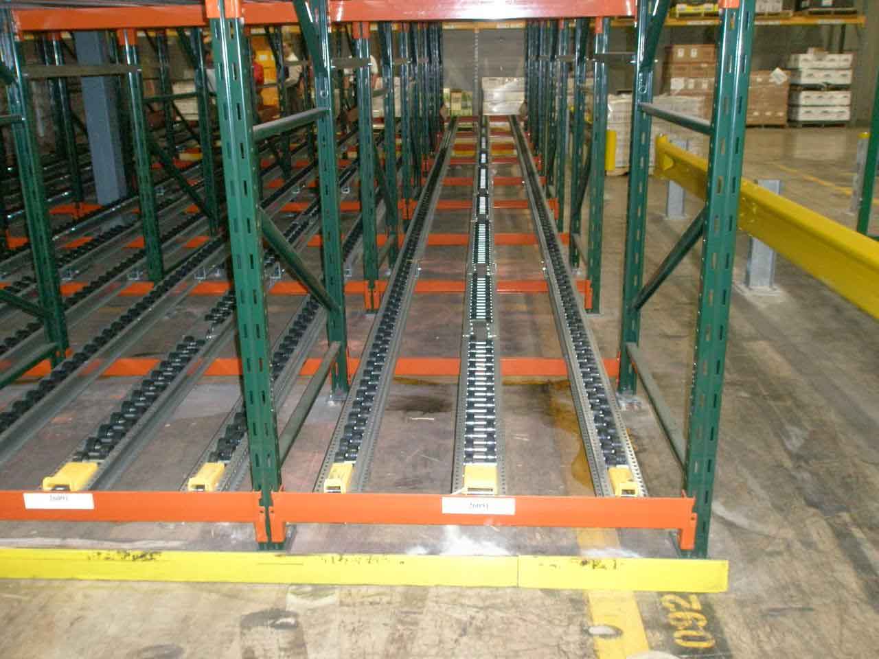 Empty pallet flow shelves sit next to one another