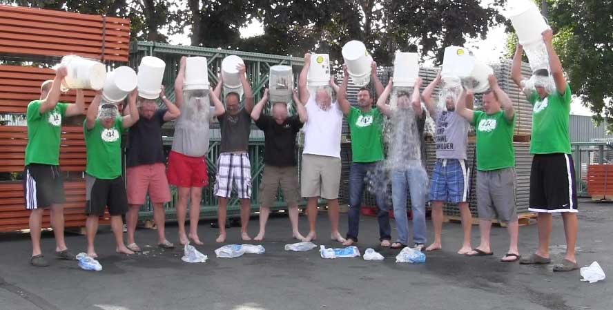 AK Employees dump buckets of ice water over their heads for the ALS Ice Bucket Challenge
