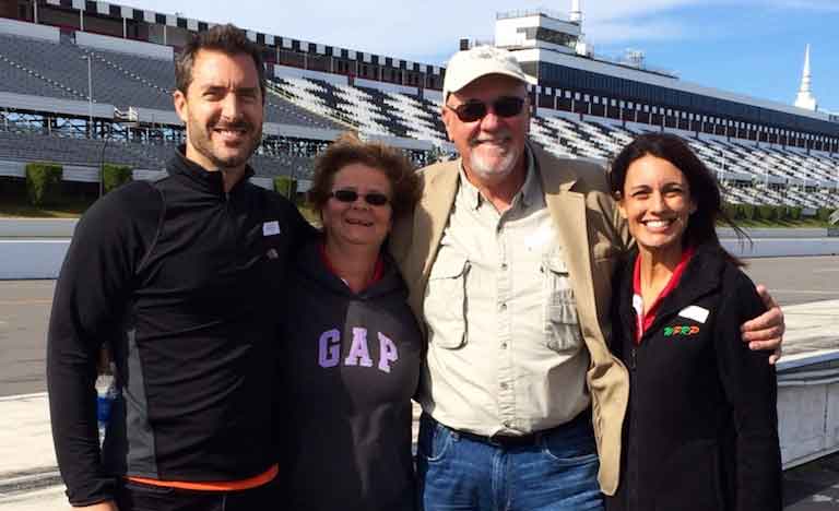 four people from ak material standing together