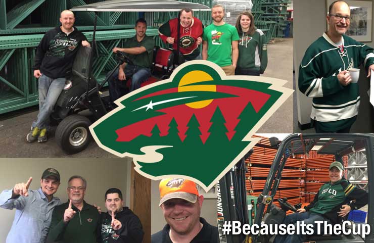 AK Employees smile at thte camera wearing jersey's for the minnesota wild hockey team