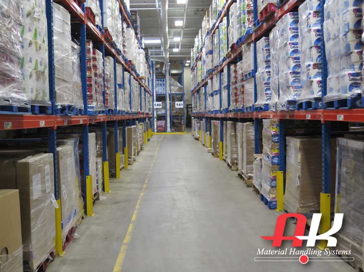 Two aisles of Pallet Racking in Miner's distribution center that is filled with product