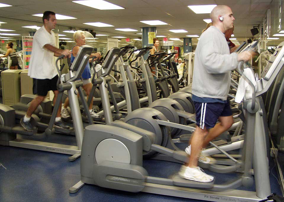 People work out on ellipticals