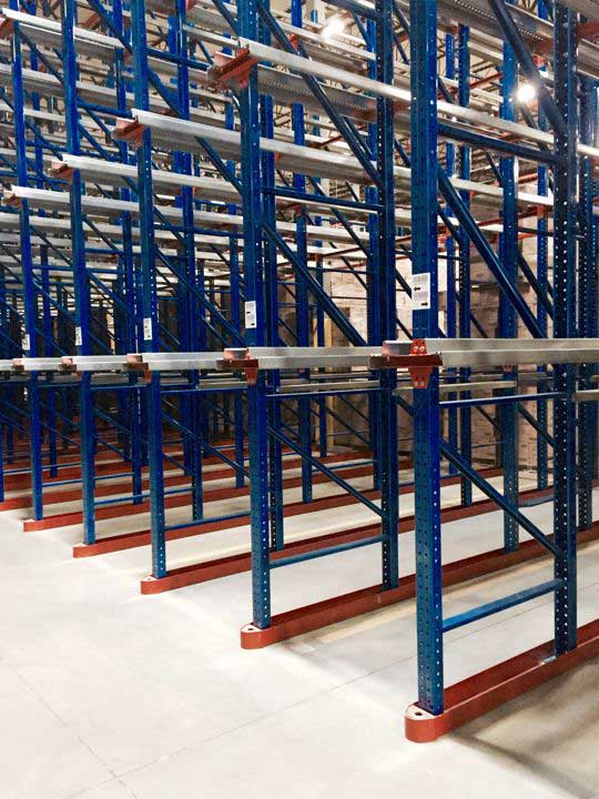 empty drive in pallet rack system with floor rub rails