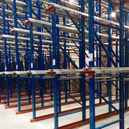 empty drive in pallet rack system with floor rub rails