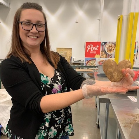 AK employee with a heart-shaped potato