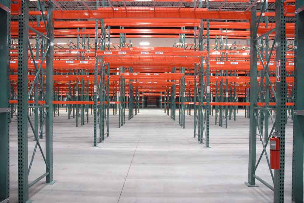 New teardrop pallet racks assembled in a new warehouse ready for products.