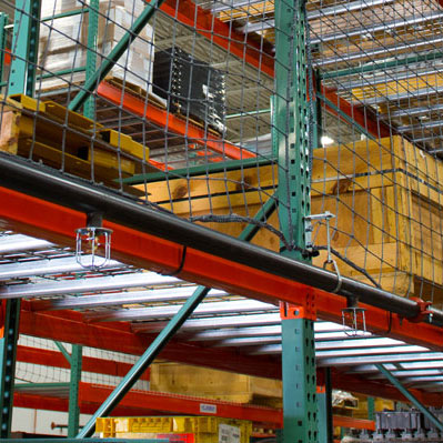 in-rack sprinkler system on selective pallet racking in a warehouse